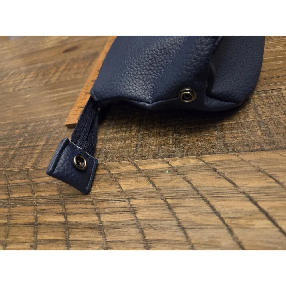 doTERRA Yarrow Pom pouch has a pebble-grain texture and durable construction